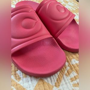 COACH Pool slides, size 11. Barely worn but there is markings on the bottom.